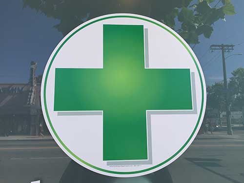 Green plus sign representing medical marijuana use