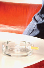 Photo of a cigarette in an ash tray