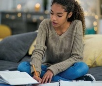 A teenage girl doing homework