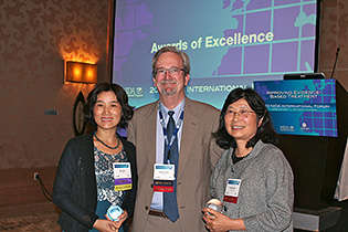 From left, Min Zhao, China; NIDA International Program Director Steven W. Gust, Ph.D.; and Yih-Ing Hser, UCLA.