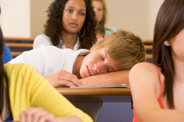 male student sleeping in class