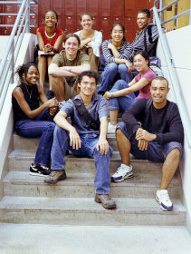 A group of teens sitting on steps